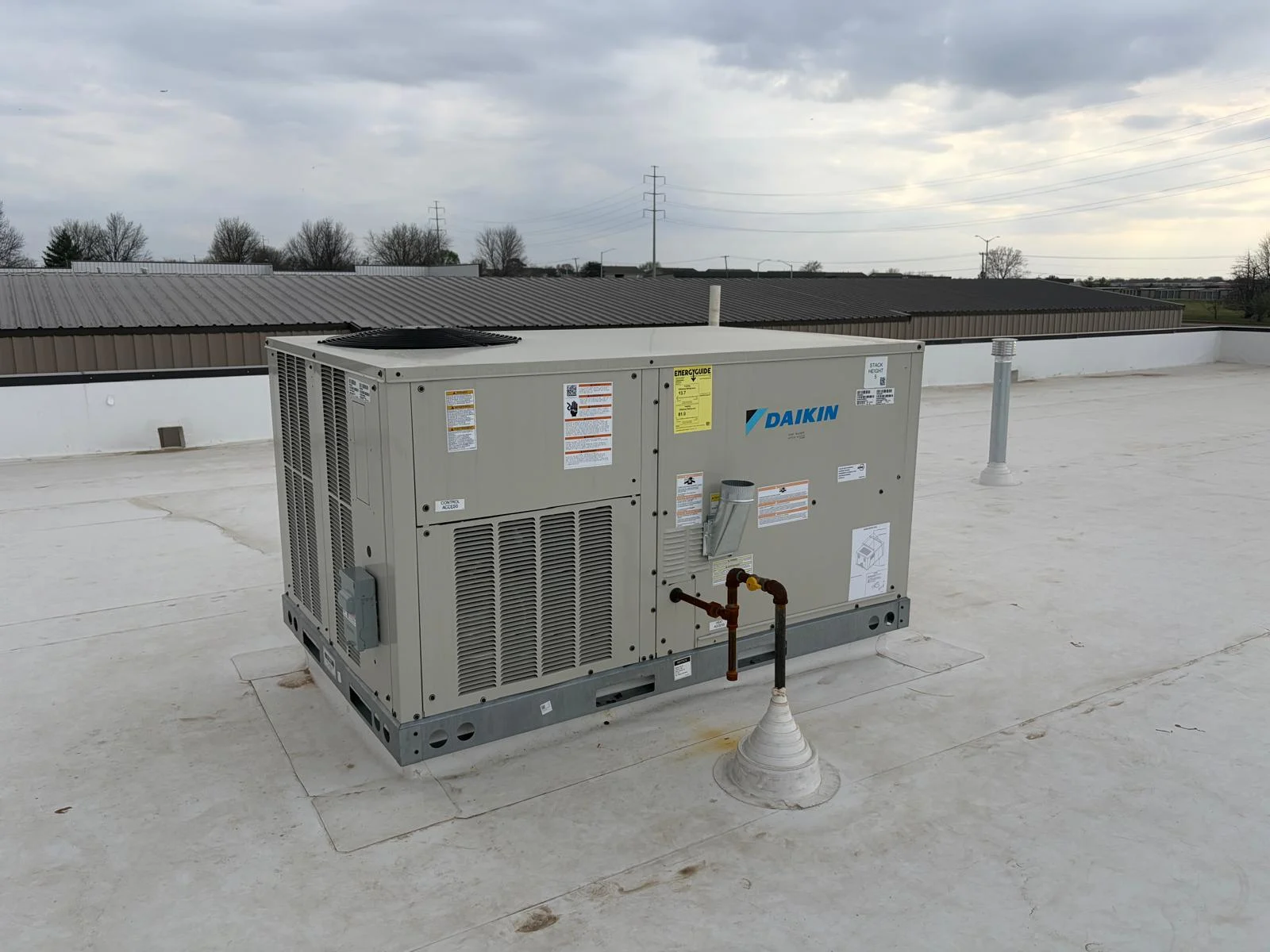 Daikin commercial packaged rooftop unit installation with gas line